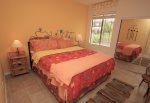 Guest bedroom offers a king bed
